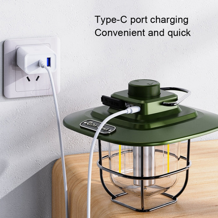 Green LED retro lantern with Type-C port and charging cable connected to base.