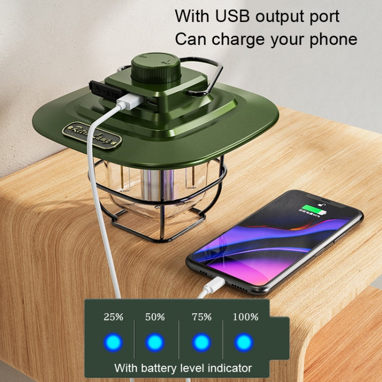 Green LED retro lantern with USB output port, charging phone on wooden table.