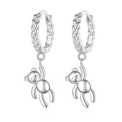 Silver-tone twist hoop earrings with dangling bear charms and linked chain drop