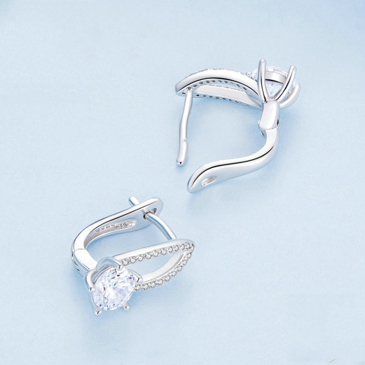 Back view of sterling silver hoop earrings with zirconia halo and hinged clasp