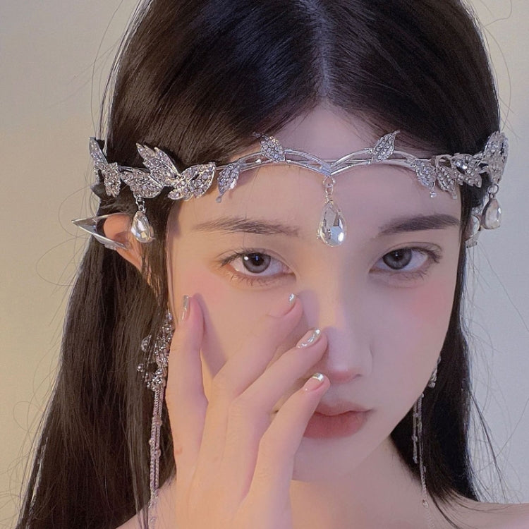 Silver rhinestone leaf crown hair band on model with teardrop side charms