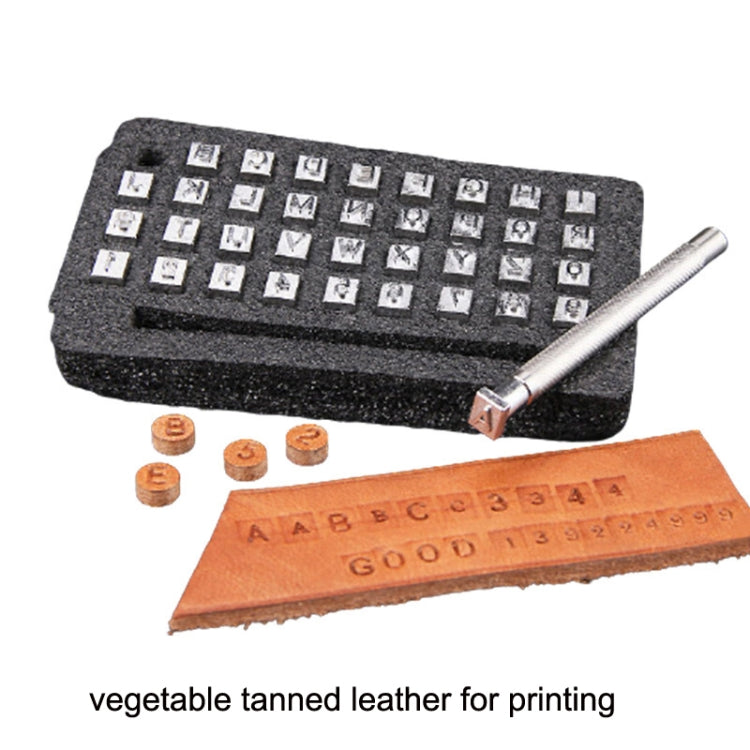 Leather stamping punch set with foam case, metal handle, and alphabet character tiles