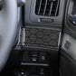 Carbon fiber patterned dashboard trim cover sticker installed near vents and controls
