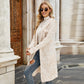 Beige long hooded knit cardigan with zebra-like pattern, open front, long sleeves