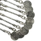 Silver-tone collarbone chain with embossed oval charms and ring links