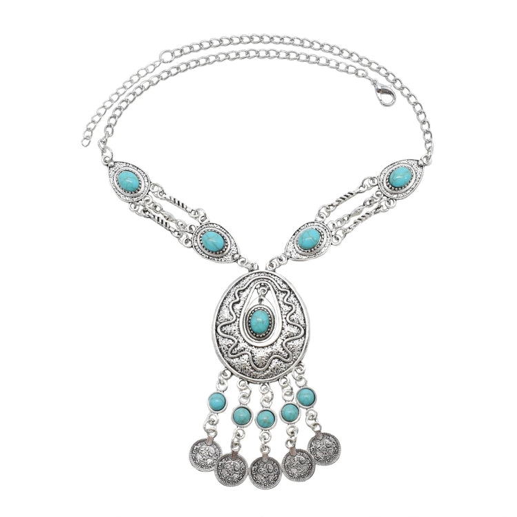 Tassel statement necklace with silver chain and oval turquoise gemstone centerpiece and drops