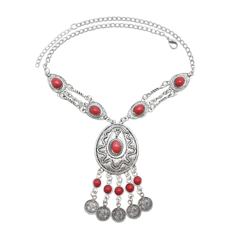 Tassel statement necklace with silver chain and red oval gemstone centerpiece with dangling charms