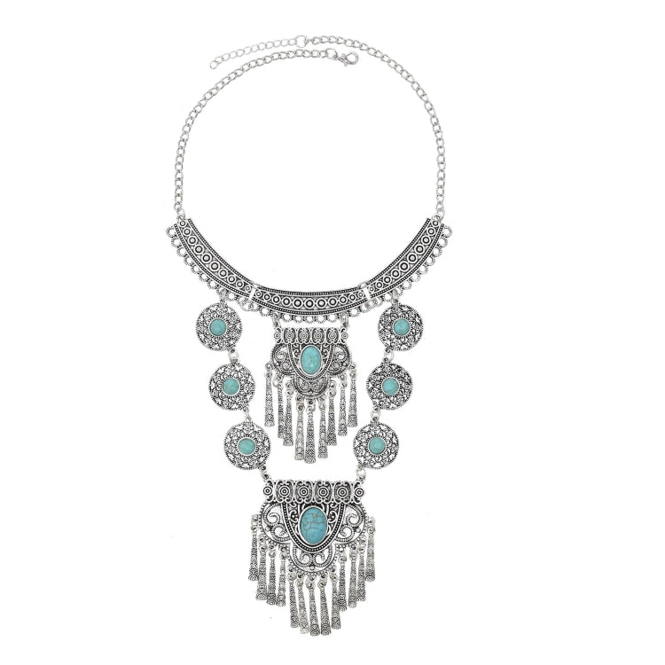 Tassel statement necklace with silver chain and turquoise gemstone centerpiece with dangling tassels