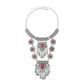 Tassel statement necklace with silver chain and red gemstone centerpiece with dangling charm drops
