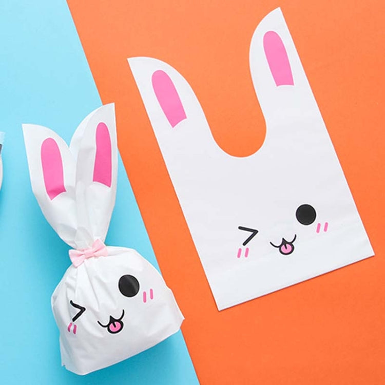 Rabbit-ear gift bag, white with pink inner ears and cute cartoon bunny face.