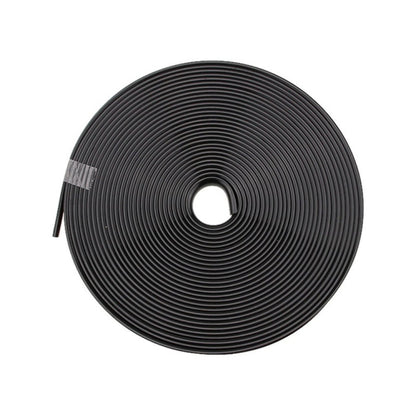 Wheel anti-collision strip roll, black coiled sticker with center hole.