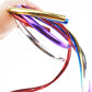 Hand holding glossy reflective electroplating wheel decorative strips in mixed colors