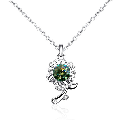 Silver sunflower pendant necklace with green round gemstone and leaf-shaped accents