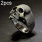 Silver-tone horror skull ring with raised skull face and textured surface