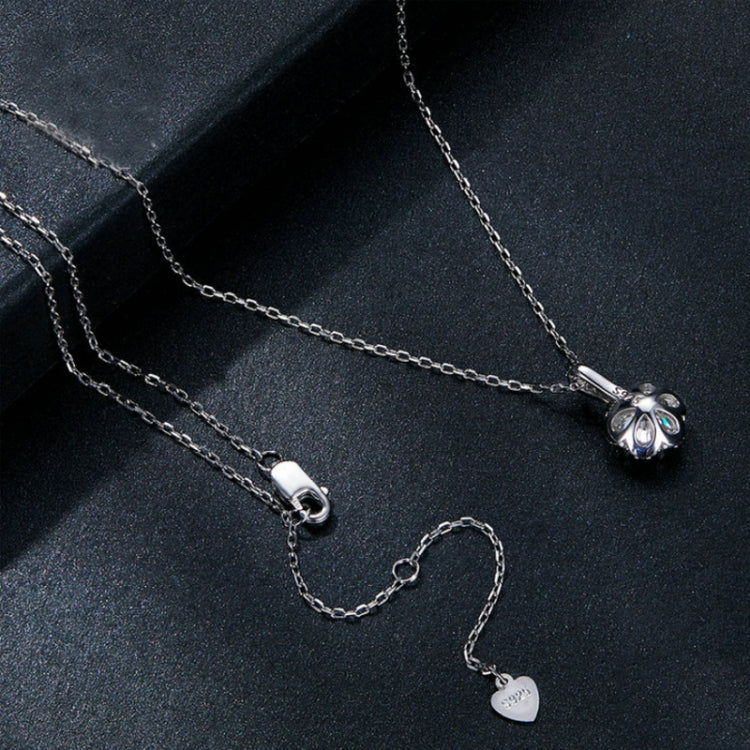 Sterling silver zircon pendant necklace with round charm, chain, and heart tag clasp
