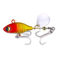 Sequin fishing lure with red/yellow body, white spinner blade, twin treble hooks