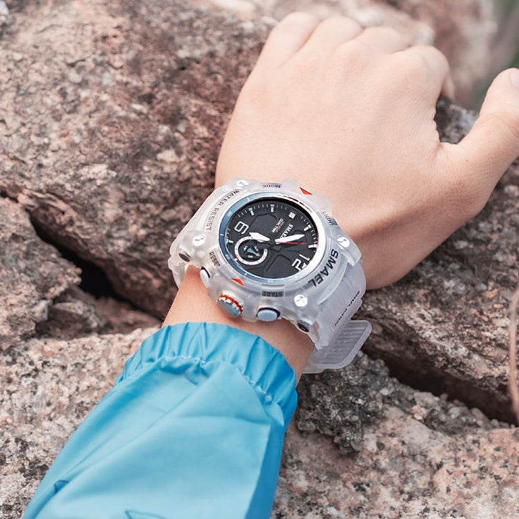 Silver SMAEL waterproof quartz sports watch worn on wrist with textured band