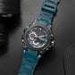 Men's sports alloy watch with blue rubber strap and dark dial from side angle