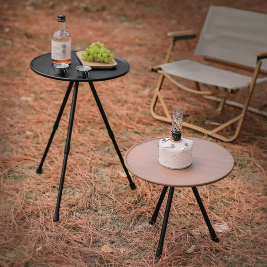 Portable folding camping tables with round tops and tripod legs