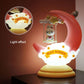 Moon-shaped table lamp night light glowing warm light on base