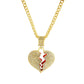 Gold chain necklace with heart pendant with red cutout and rhinestones