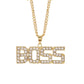 Gold-tone rhinestone chain necklace with large “BOSS” pendant