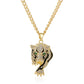 Gold-tone rhinestone chain necklace with lion head pendant and green accents