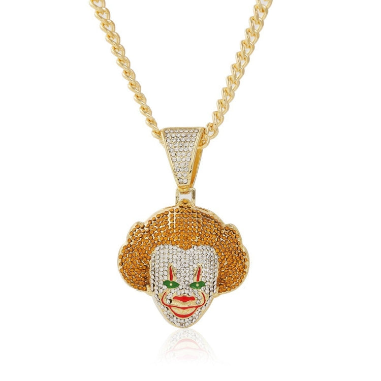 Gold-tone rhinestone chain necklace with heart face pendant and red details