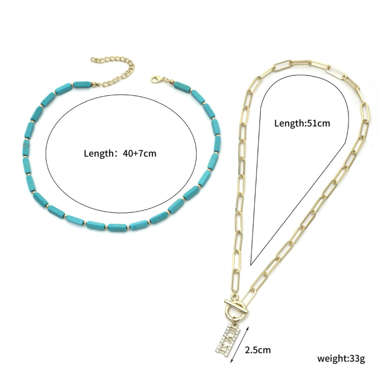 Turquoise bead and gold-tone necklace with rectangular charm pendant, linked chain style