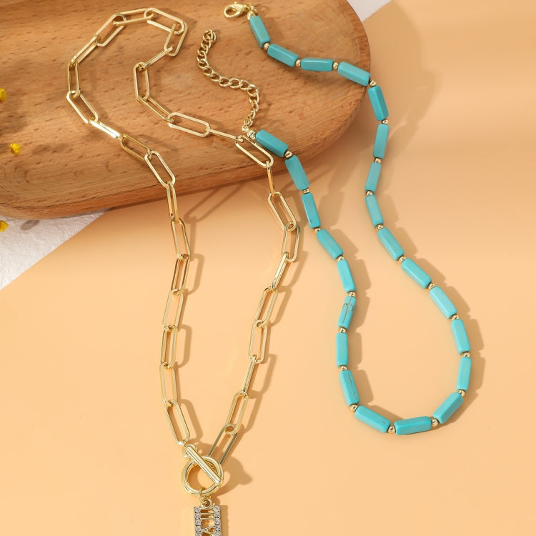 Turquoise cube-bead necklace and bracelet set with gold-tone link chains and charm pendants