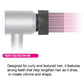 Wide tooth comb nozzle attachment in profile with pink and black tip ring
