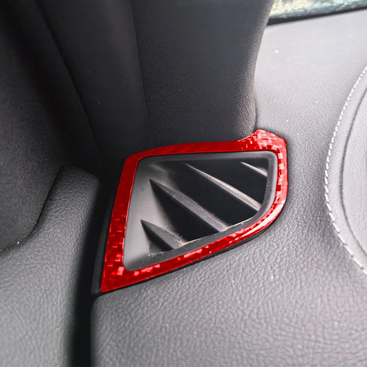 Red carbon-fiber air vent trim sticker applied on dashboard vent