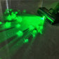 Green LED glow from vacuum roller brush light with dust and debris effects
