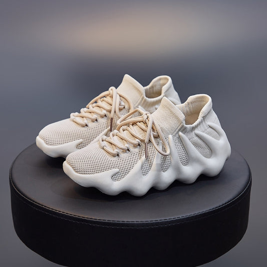 Beige woven sock shoes with lace-up fronts and sculpted thick soles