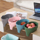 Elephant-shaped kitchen drain basket set in pink, gray, blue, and green on a table