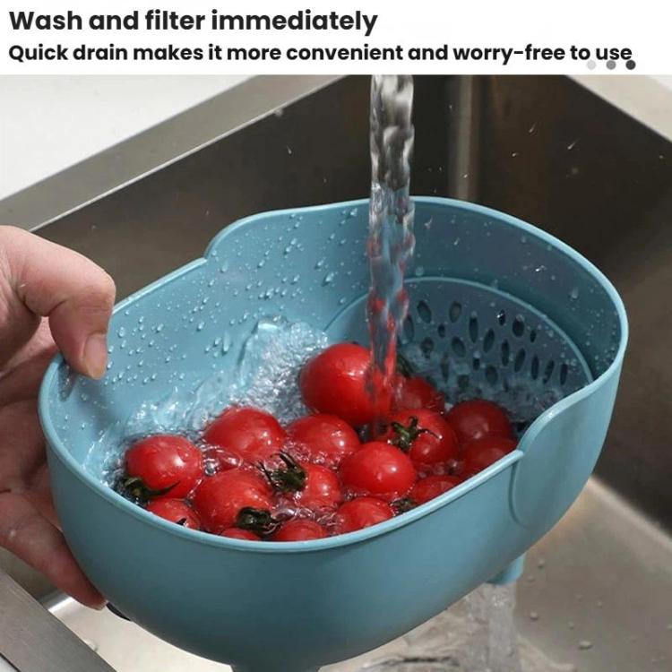 Blue elephant-shaped drain basket in sink with tomatoes under running water