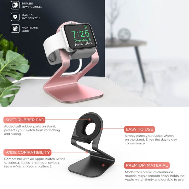 Rose gold Apple Watch stand with black cradle and soft rubber contact pad