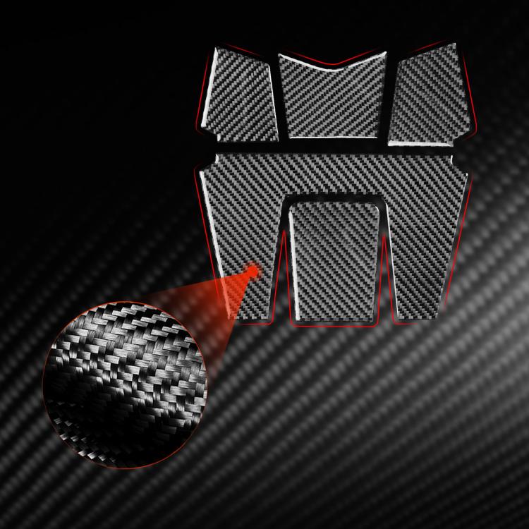 Carbon-fiber fuel tank surround decal set with black texture close-up detail