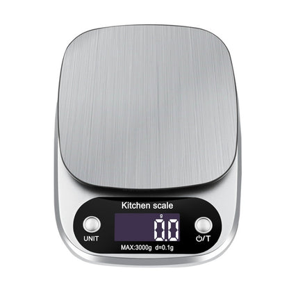 Digital kitchen scale with brushed metal platform and LCD display showing 3000g max