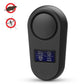 Black ultrasonic pest repellent with rounded body, circular top, and blue controls.