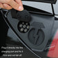 Black silicone charging port cover being pressed onto the charging port opening