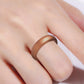 Wide bronze silicone glitter ring on finger