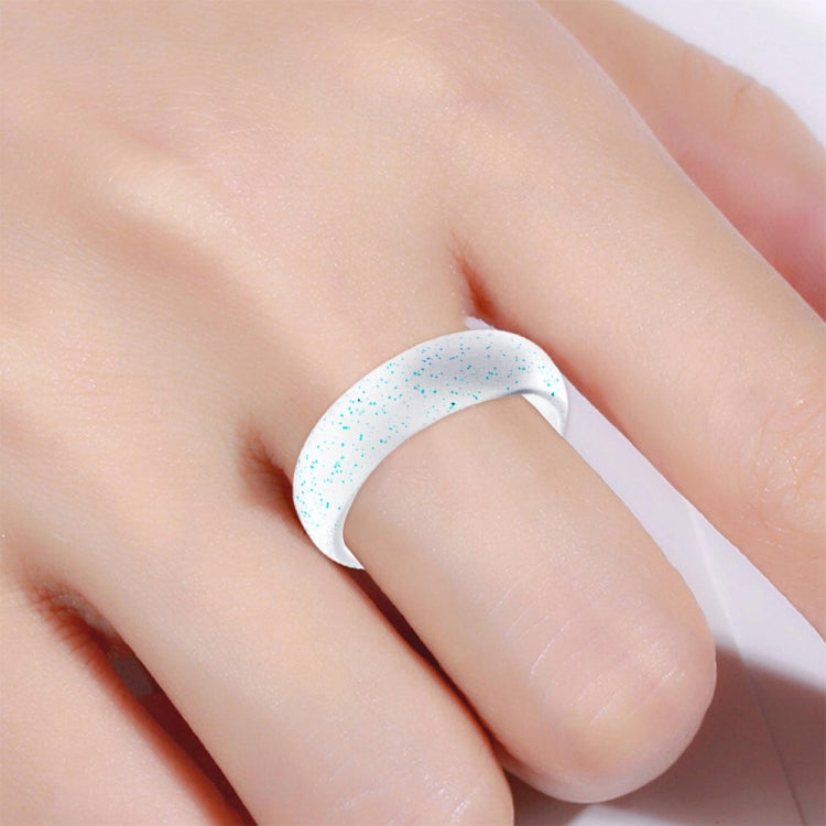 Glitter silicone ring, wide band, light blue speckled design on finger