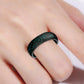 Glitter wide silicone ring in dark green speckled black on finger