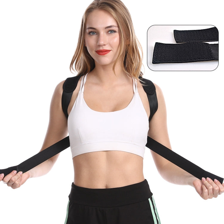 Black posture corrector with padded shoulder straps and adjustable back band