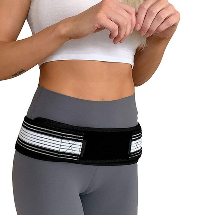 Postpartum pelvic correction belt on hips with black wrap and white striped support panel
