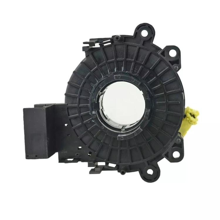 Black clock spring coil with mounting holes and connector blocks, 25554-3DN0A
