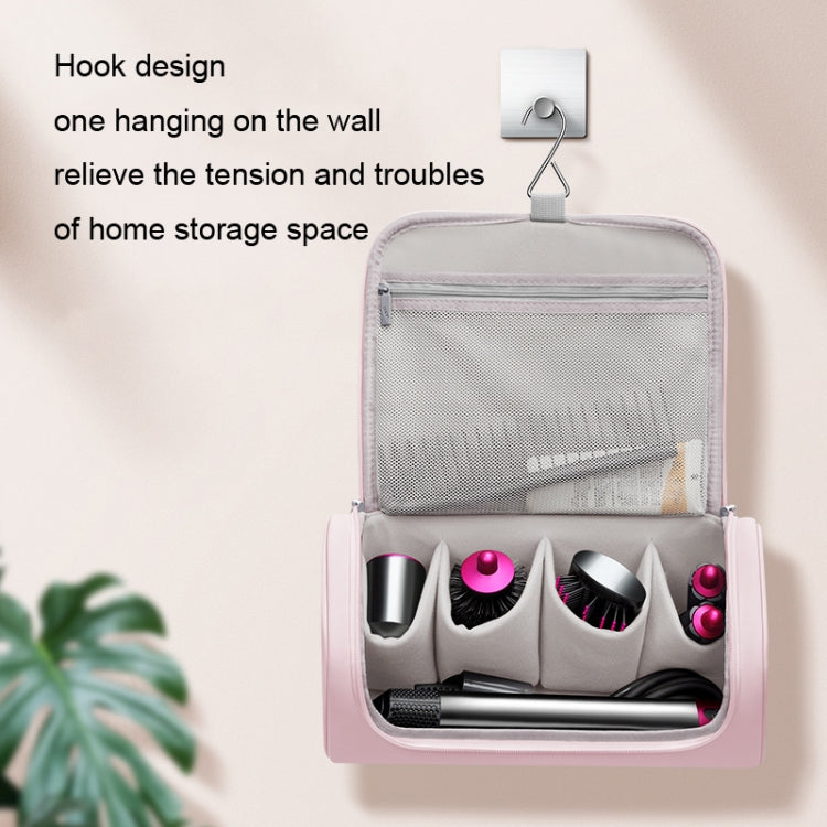 Pink hanging hair tool storage bag with front mesh pocket and organizer compartments