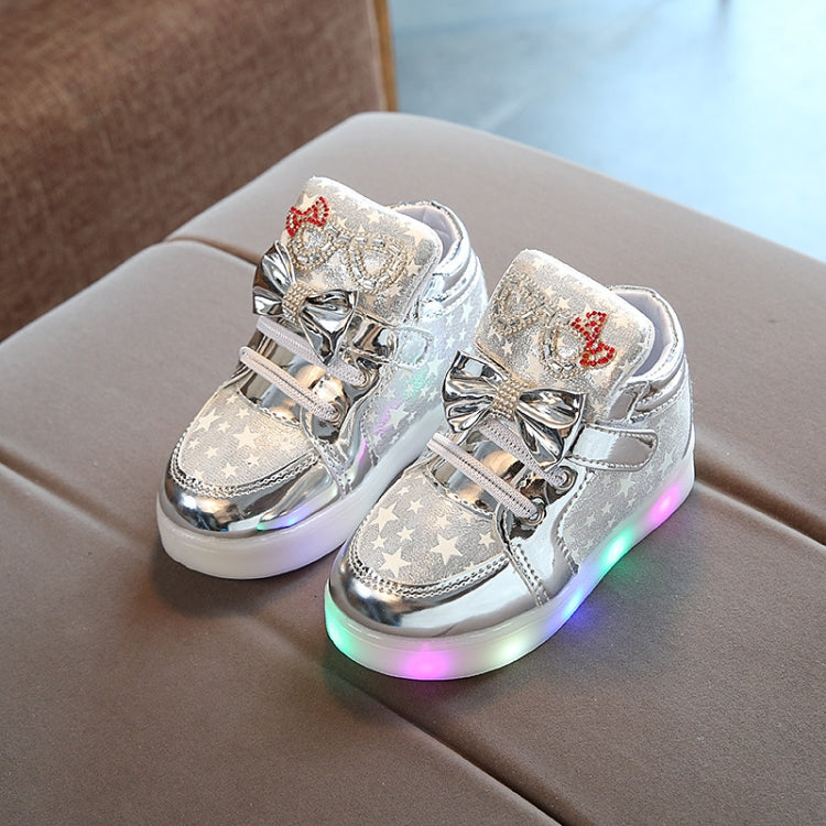Kids luminous flashing light sneakers, silver glitter upper with star print and lit sole