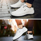 Men's white leather casual sneakers with lace-up front and black-trimmed sole